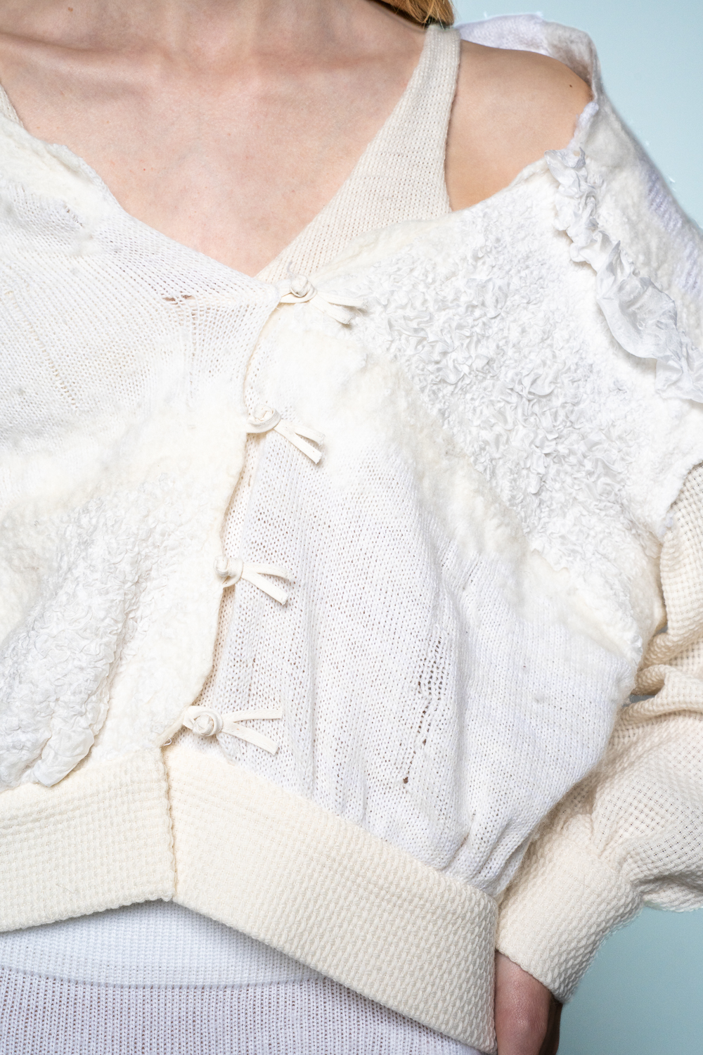 This unique piece is carefully crafted in Estonia using sustainable techniques. It is made from textile remnants, knitting samples, 100% merino wool and 100% silk, combined using the wet-felting technique.Wet felting is an ancient craft technique in which wool fibres bind together through the use of warm soapy water and mechanical agitation, creating a dense felt fabric.